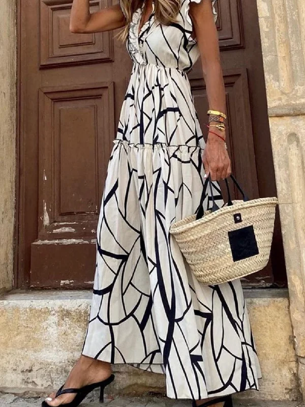 Contemporary Maxi Dress with Mesmerizing Abstract Face Print and V-Neckline Elegant Maxi Dress with Drapes
