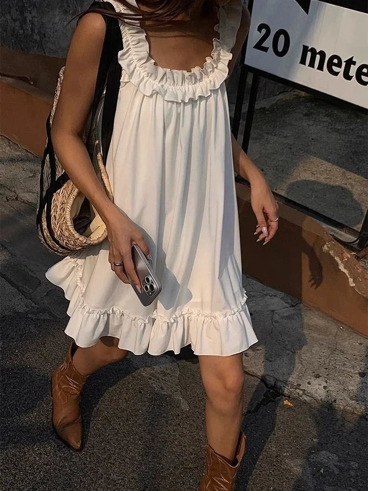 Girlary Women Casual Sleeveless Ruffles Mini Dress White Boho Beach Sundress Cute Girl Home Dresses Loose Summer Dress Oversized Modern Satin Mini Dress